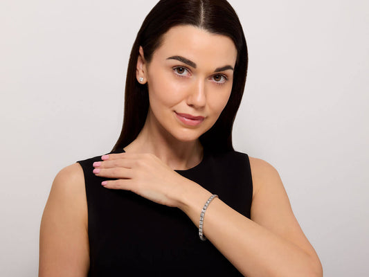 Woman wearing a platinum diamond line bracelet