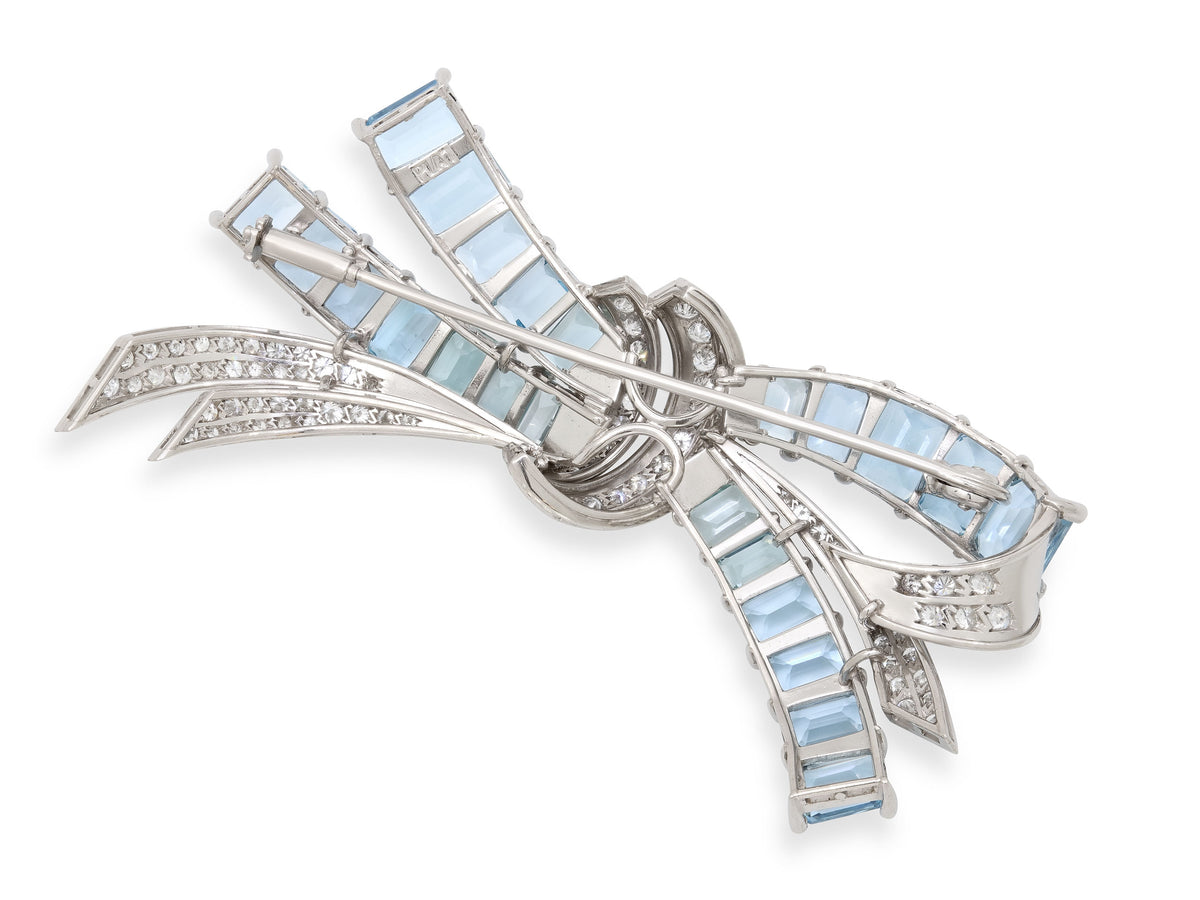 Platinum bow brooch with aquamarines and diamonds