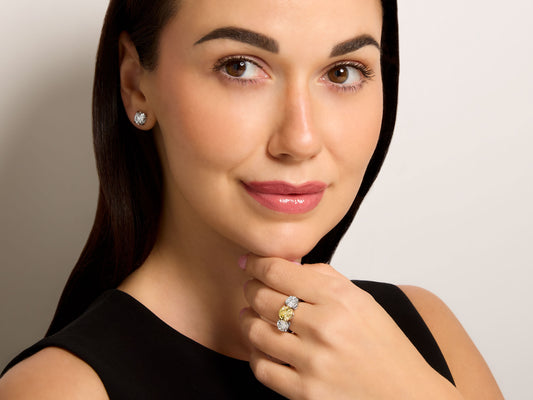 Three Stone Fancy Intense Yellow Diamond Ring, 2.06 carats, in Platinum