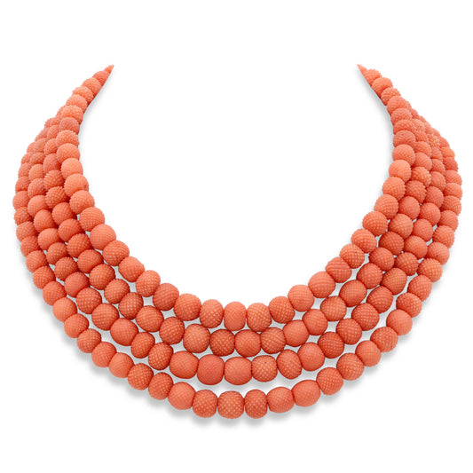 Antique Georgian Pineapple Cut Coral Necklace with 12K Gold Clasp by Beladora, four strands of textured coral beads on a white background