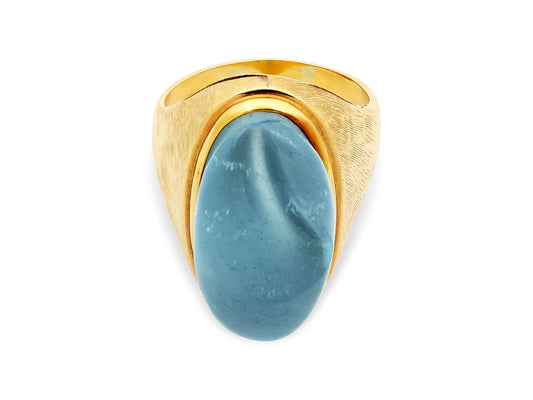 Mid-Century Burle Marx Carved Aquamarine Ring in 18K Gold by Beladora featuring a freeform blue aquamarine cabochon and brushed yellow gold setting