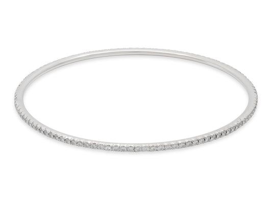 Tiffany & Co. 'Metro' Diamond Bracelet in 18K White Gold, slender polished bangle set with 110 round brilliant diamonds, shown on white by Beladora