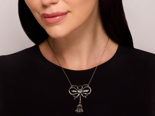 Antique Victorian Diamond Bow Pendant in Silver