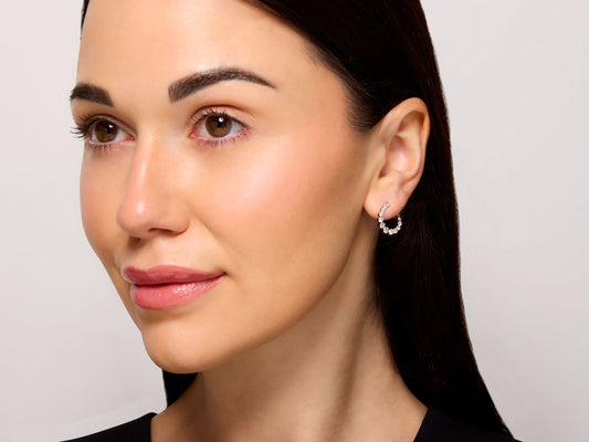 Front Back Diamond Earrings in 18K White Gold by Beladora, model wearing a semicircle of 13 round diamonds with a latch back on the ear