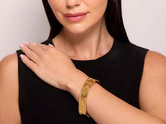Scalloped Link Bracelet in 18K Rose and Yellow Gold by Beladora, shown worn on the wrist with overlapping textured links and polished chevron accents