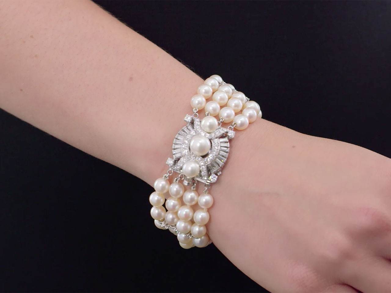 Four Strand Cultured Pearl and Diamond Bracelet in Platinum