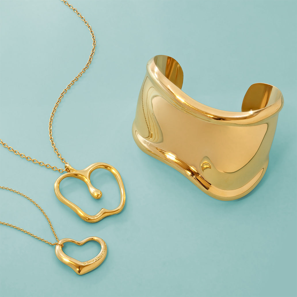 Tiffany & Co gold cuff bracelet and gold heart neckalces
