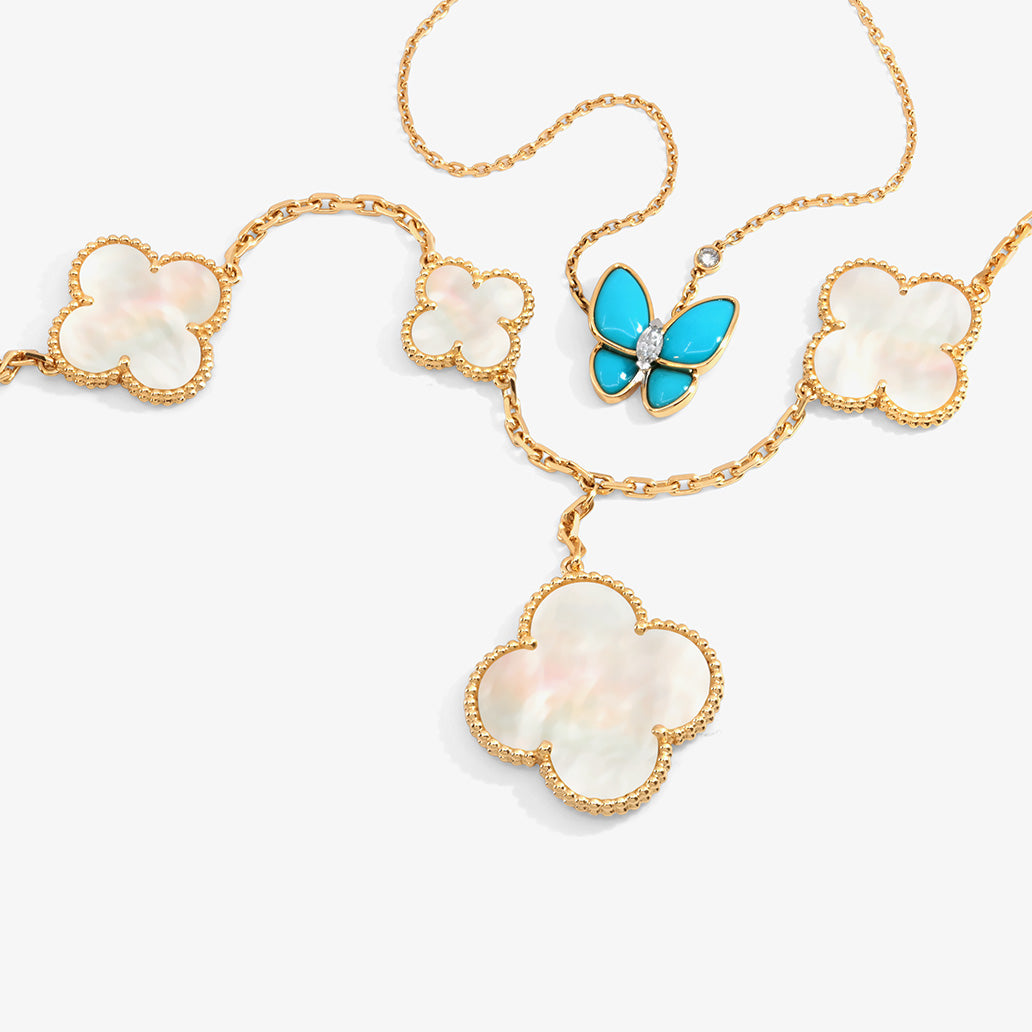 Van Cleef & Arpels iconic clover bracelet and blue butterfly bracelet