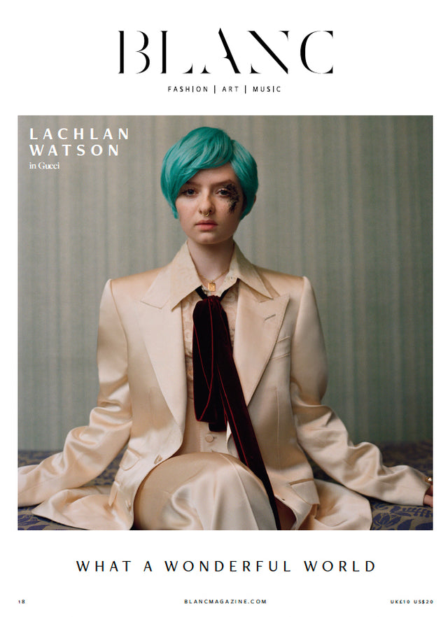 BLANC magazine cover featuring a person with teal hair in a cream suit
