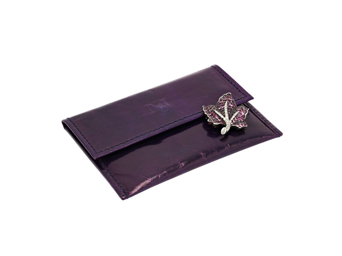 Pink sapphire and diamond leaf brooch on purple case