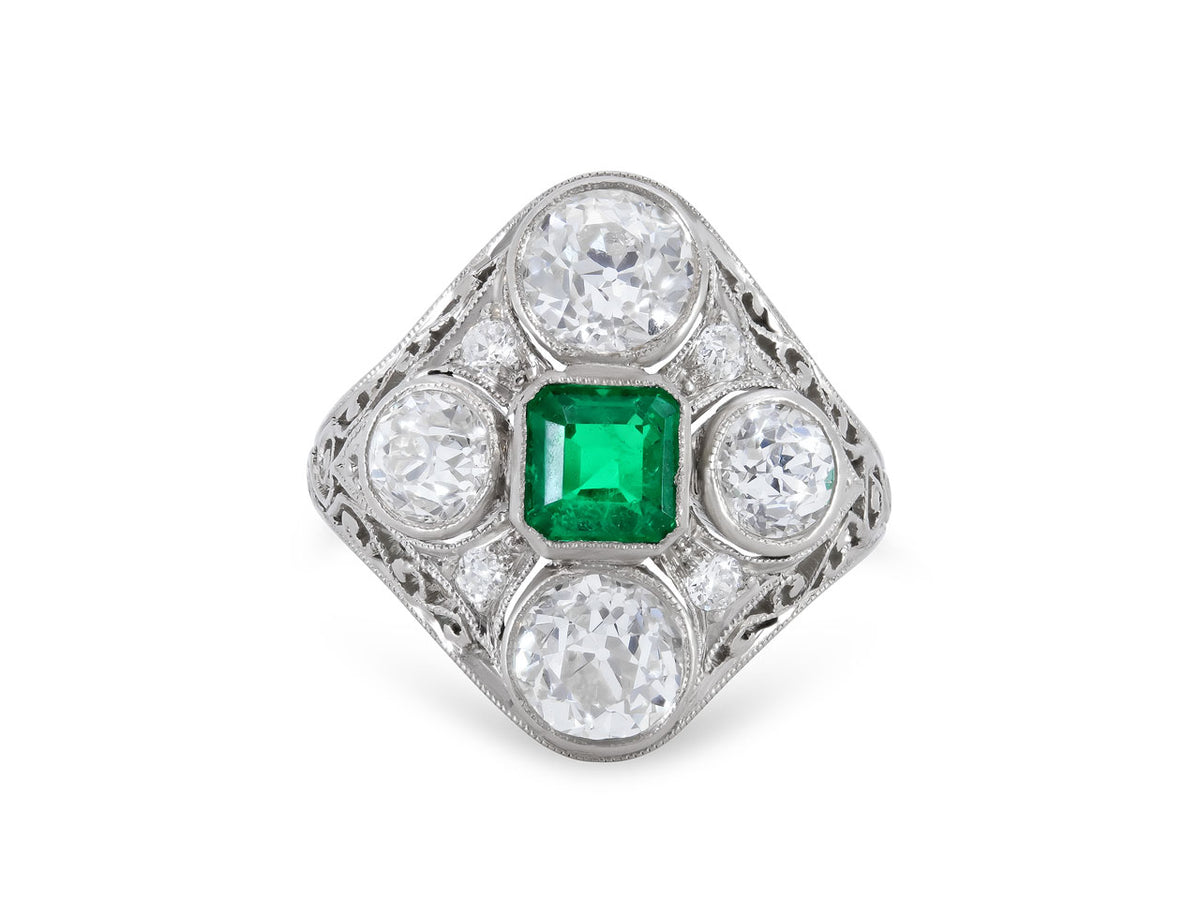 Edwardian platinum ring with square emerald and four diamonds