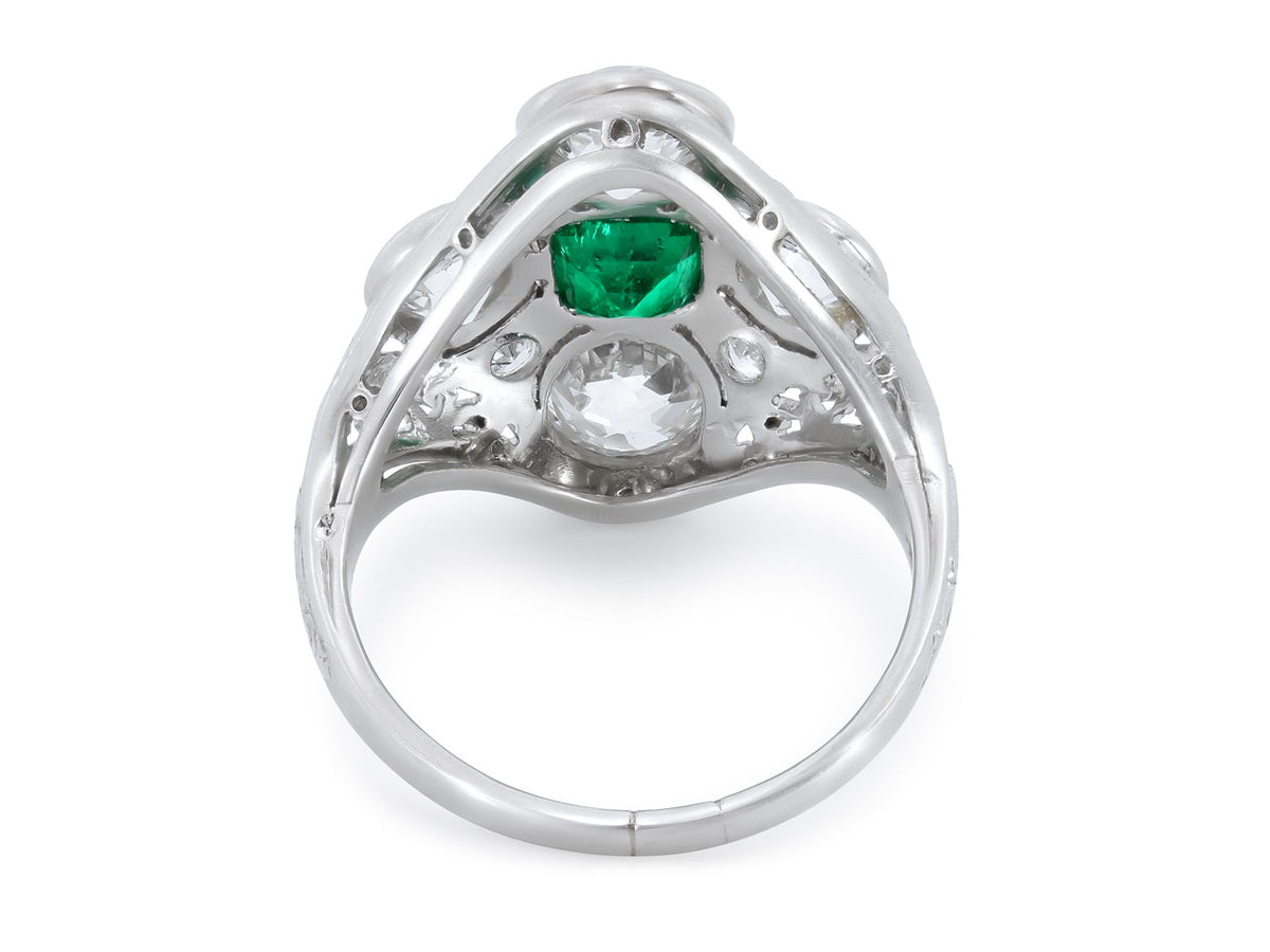 Rear view of platinum ring with emerald and diamonds