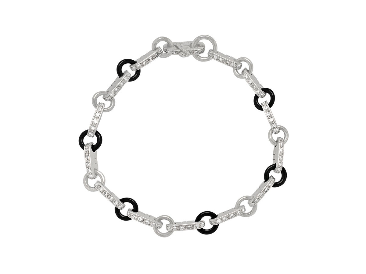 Platinum bracelet with black onyx links and diamonds