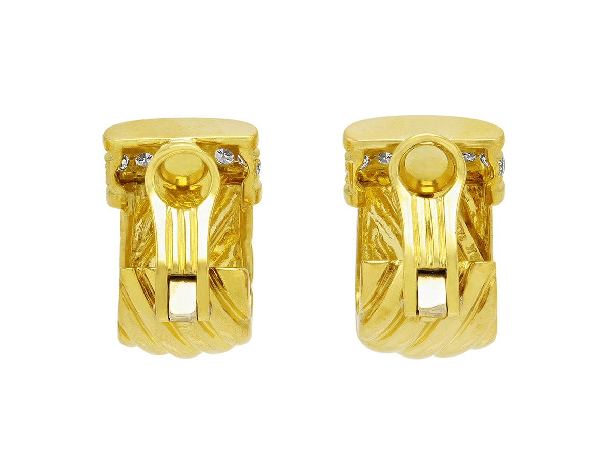 Pair of 18K yellow gold fluted earrings with diamond rows
