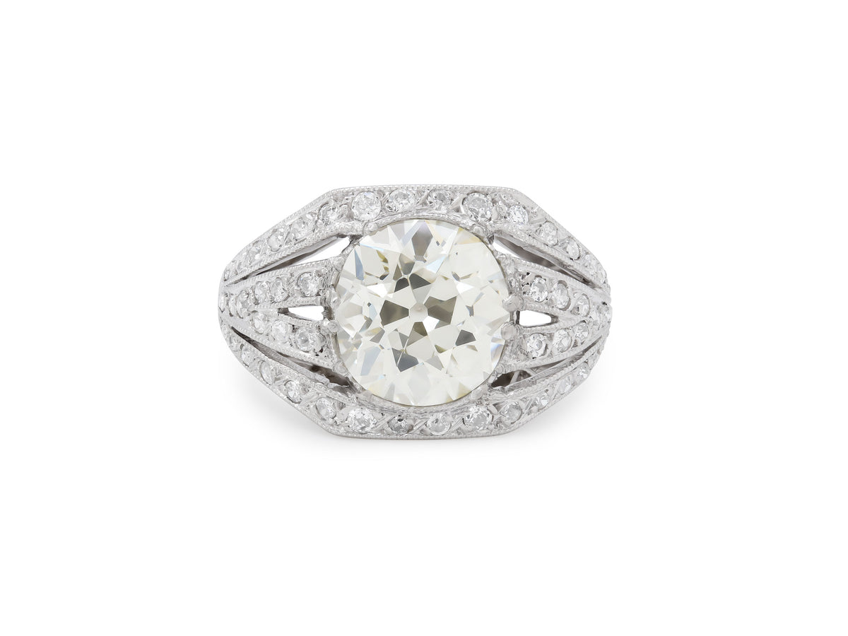 Platinum ring with old mine cut diamond and diamond accents