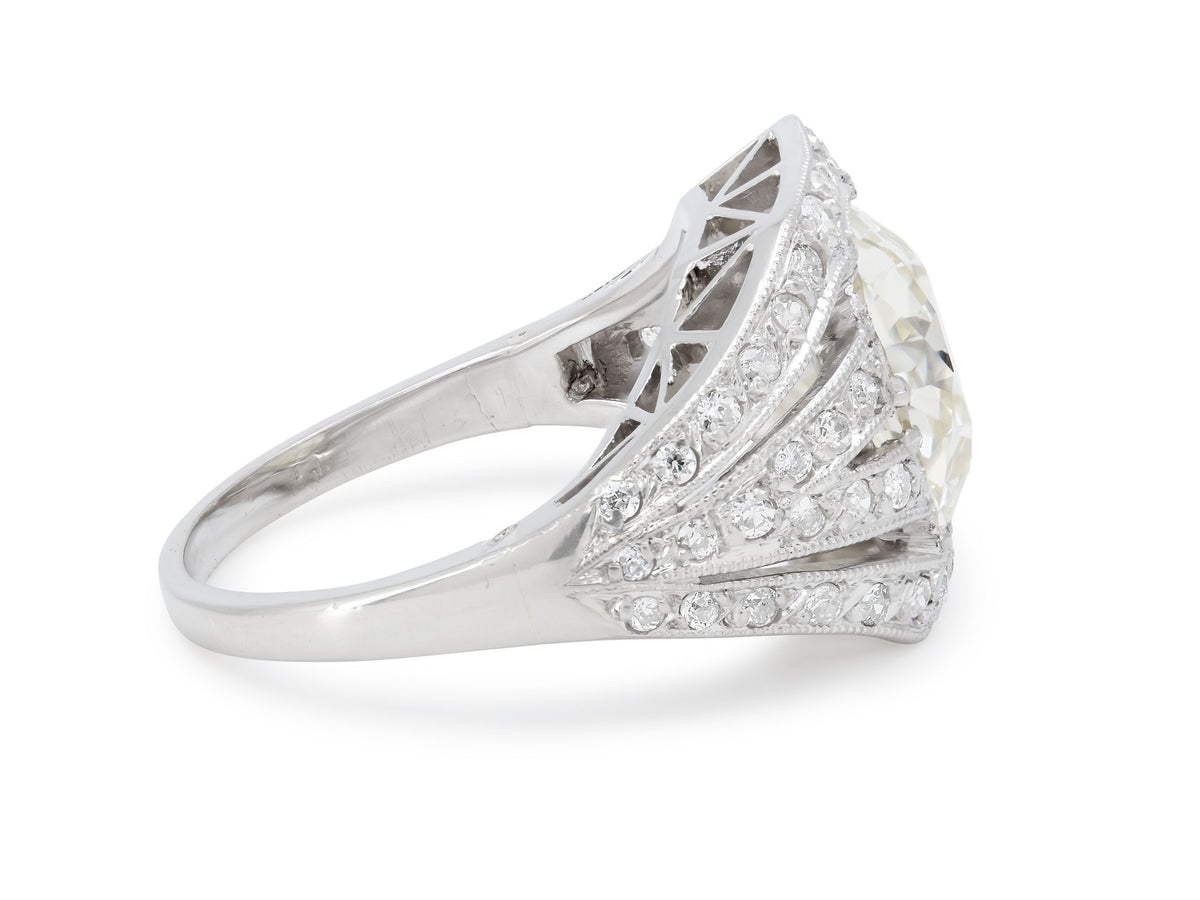 Side view of platinum ring with central diamond and diamond lines