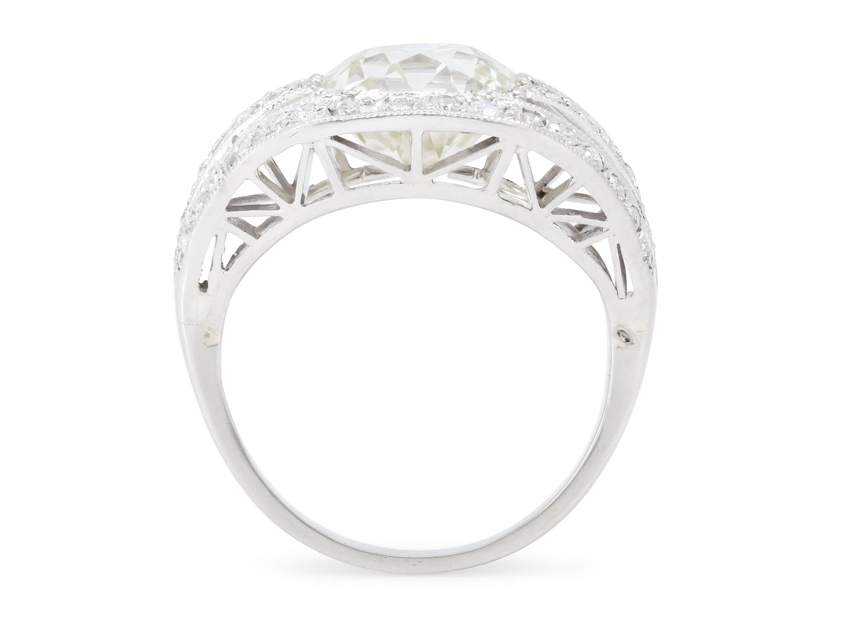 Side view of platinum diamond ring with openwork gallery