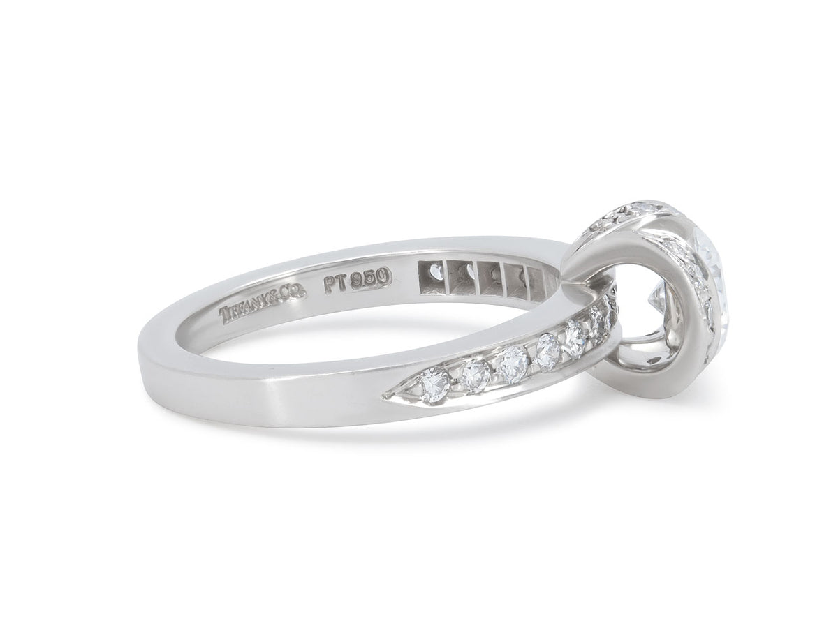 Platinum diamond ribbon ring with diamond shoulders