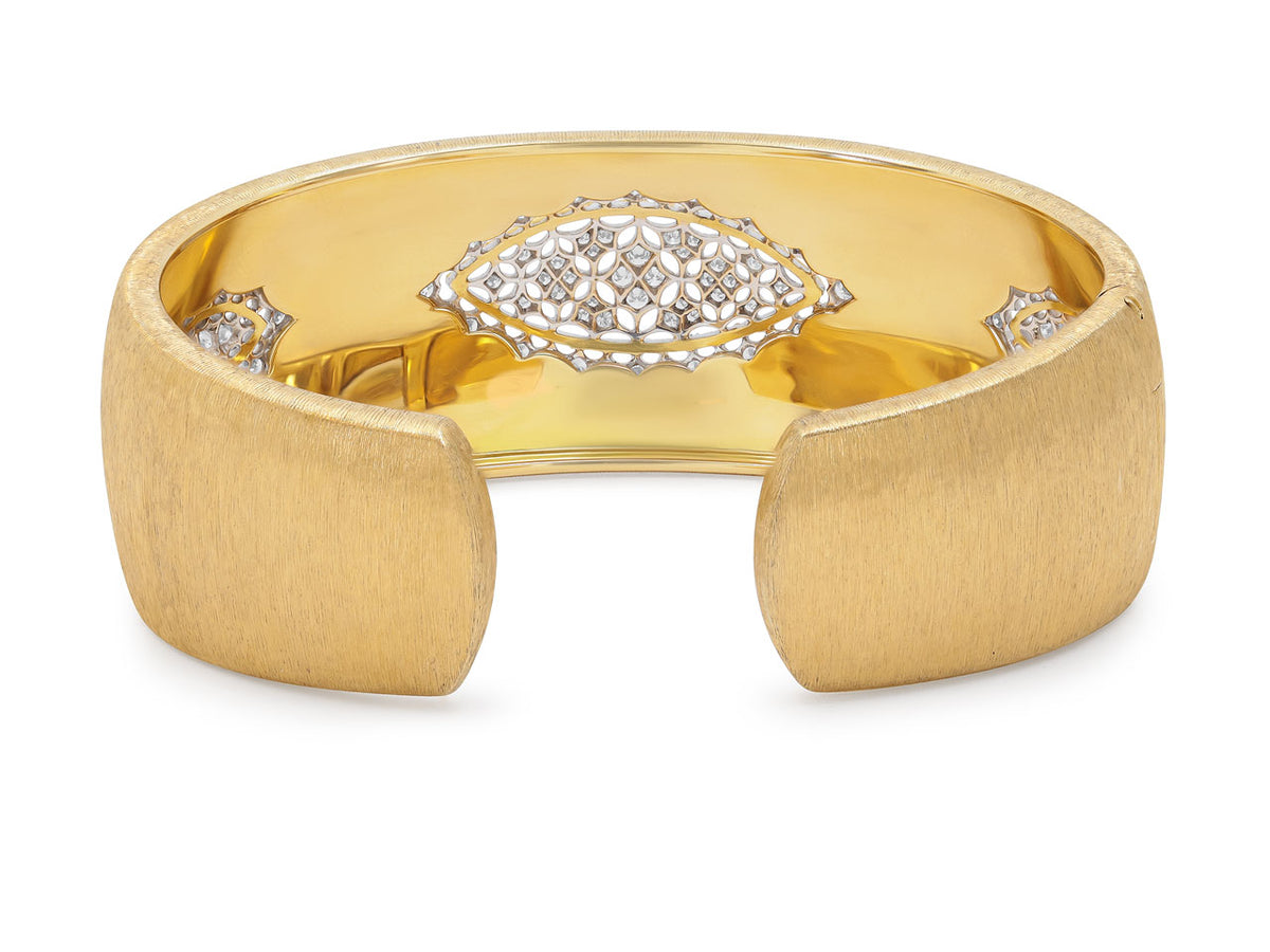 Textured 18K gold cuff bracelet with diamond motifs