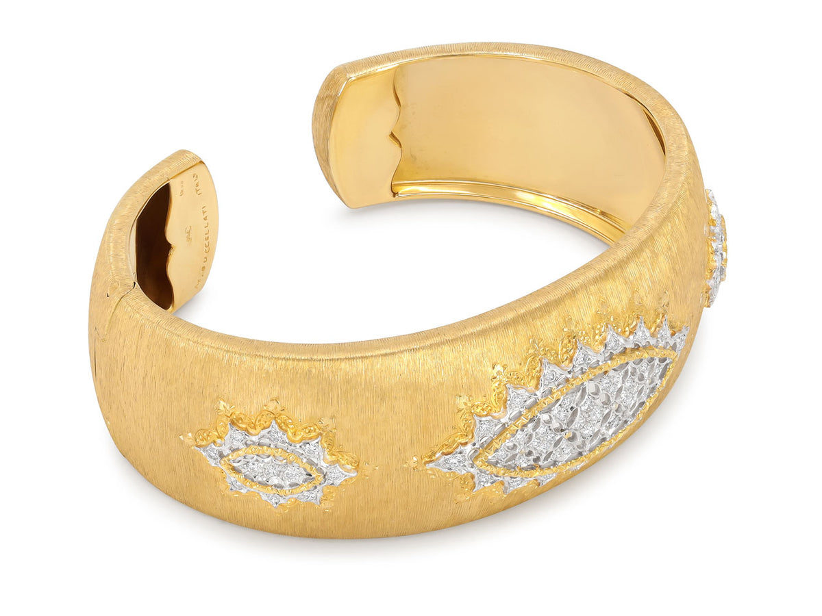 Textured 18K gold cuff bracelet with three diamond motifs