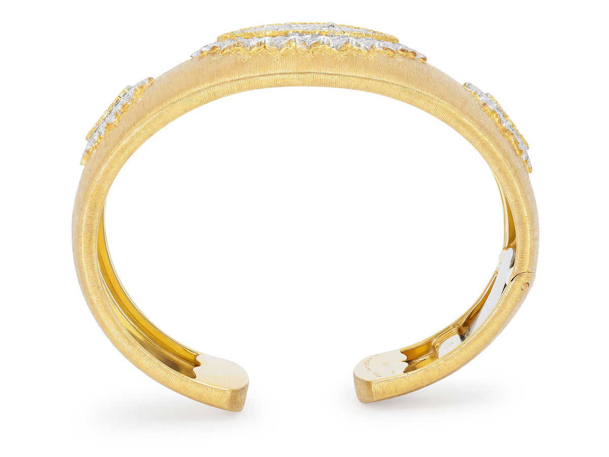 Textured 18K gold cuff bracelet with diamond motifs