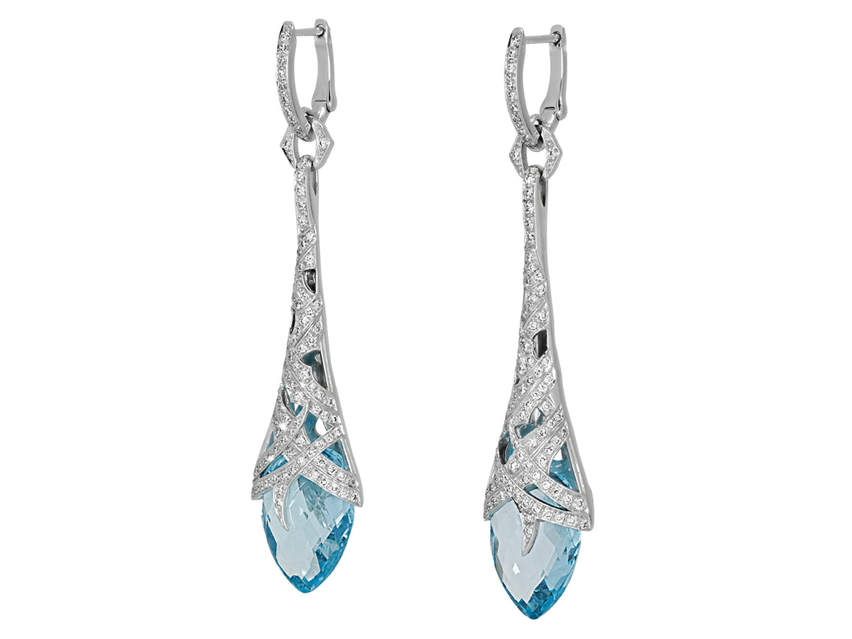 Blue topaz and diamond drop earrings in white gold