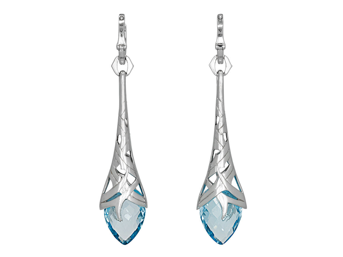 Diamond and blue topaz drop earrings in white gold