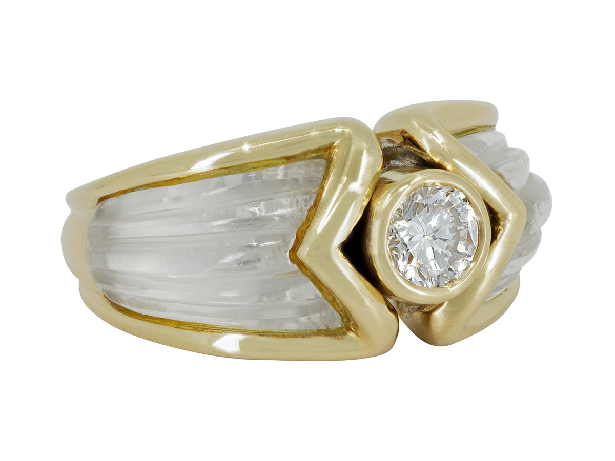 Bezel set diamond ring with rock crystal shoulders in 18K gold