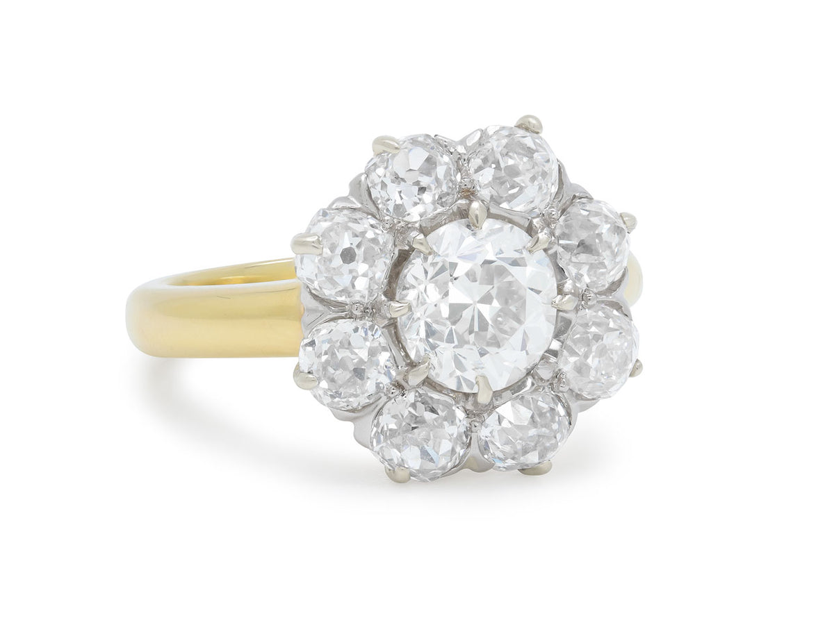 Antique diamond cluster ring with yellow gold band