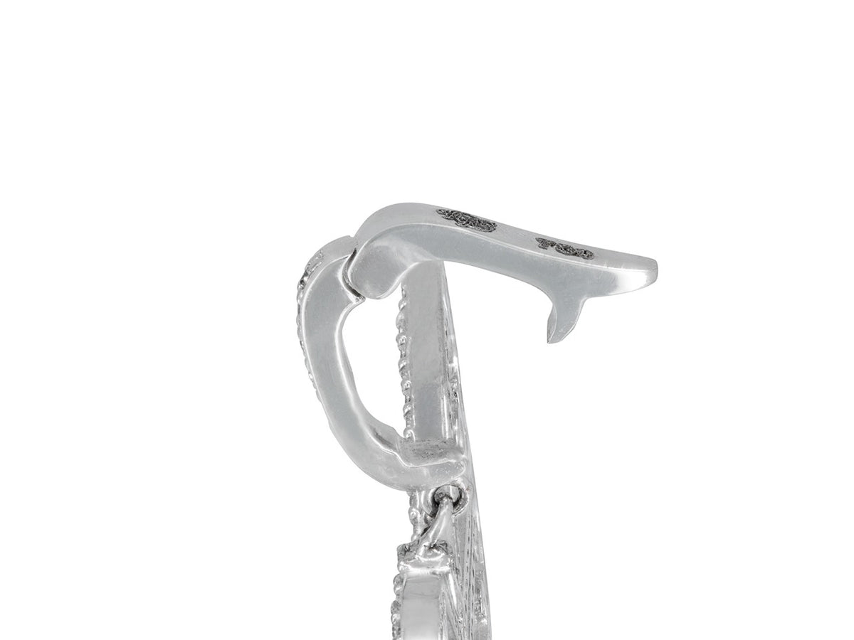 Close-up of hinged diamond set bail in white gold