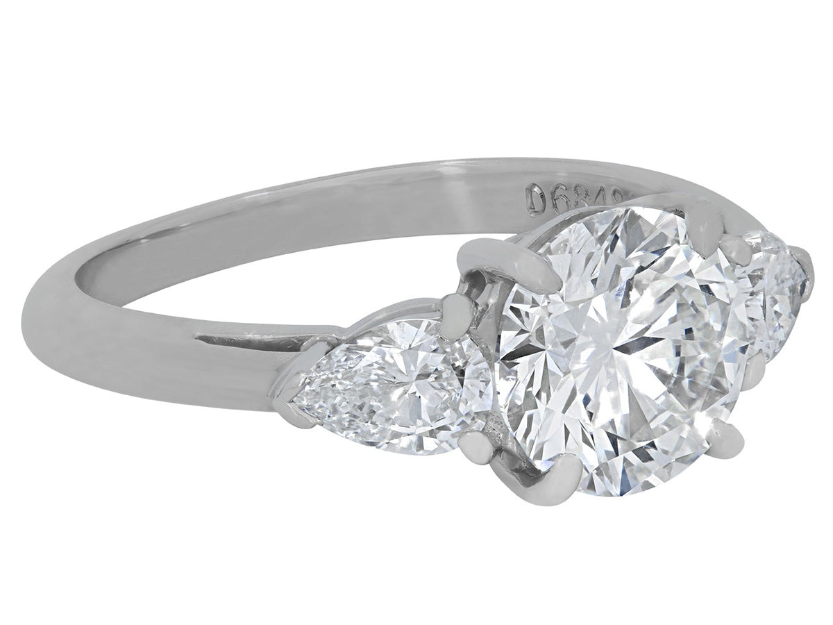 Platinum Tiffany and Co. ring with pear shaped side diamonds