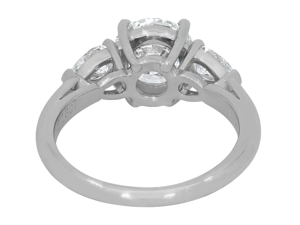 Platinum diamond ring with pear shaped side stones