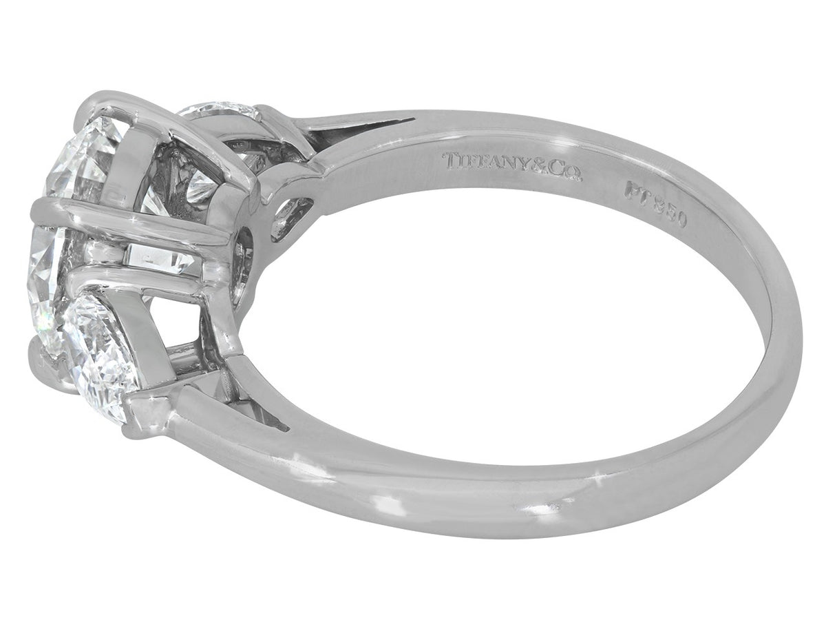 Side view of a Tiffany platinum diamond ring with pear shaped side stones