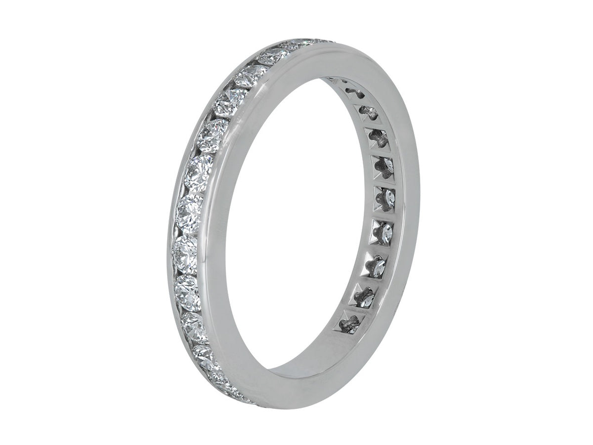 Platinum eternity band with channel set round diamonds