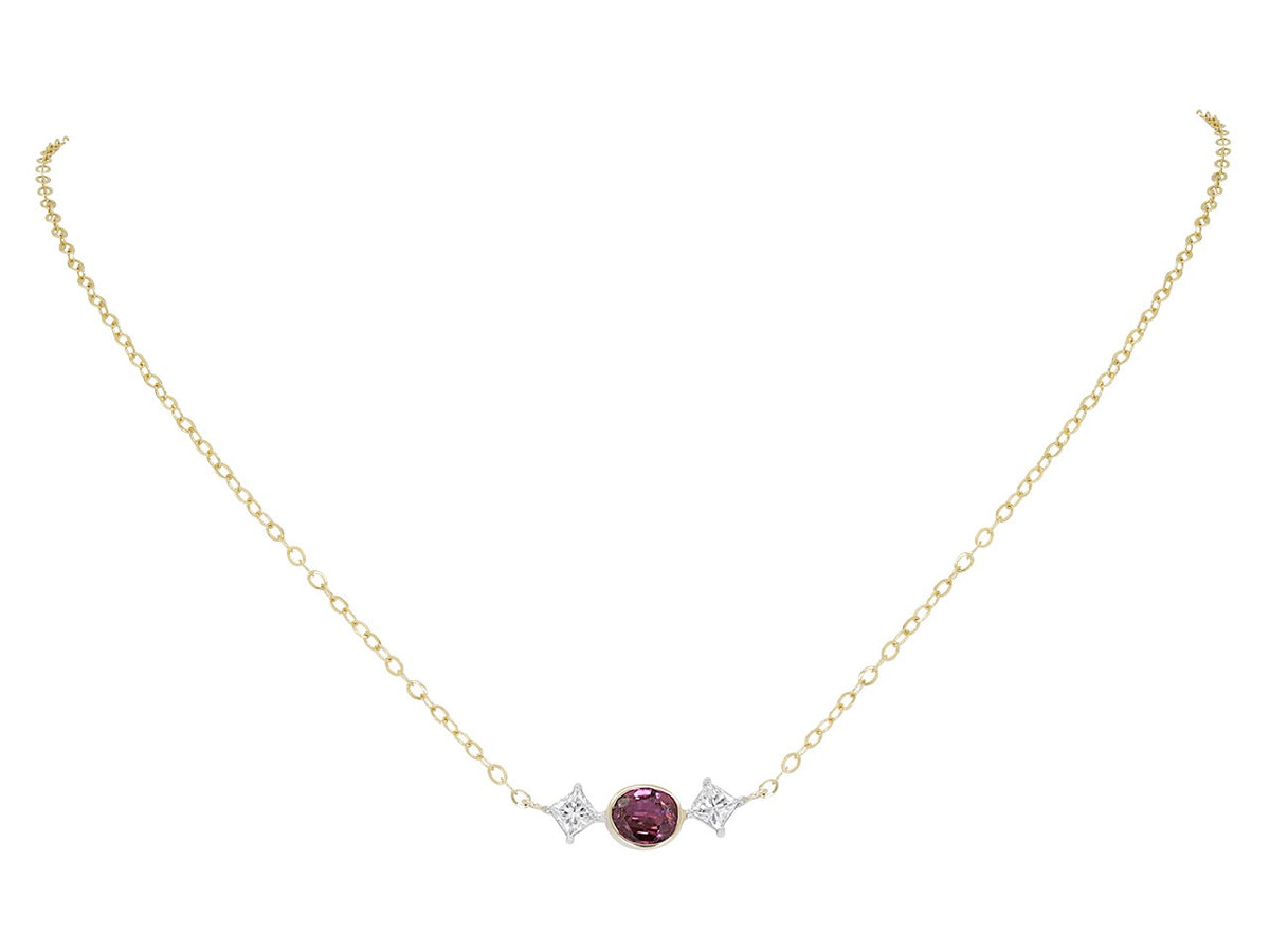 Gold necklace with oval ruby and two diamonds