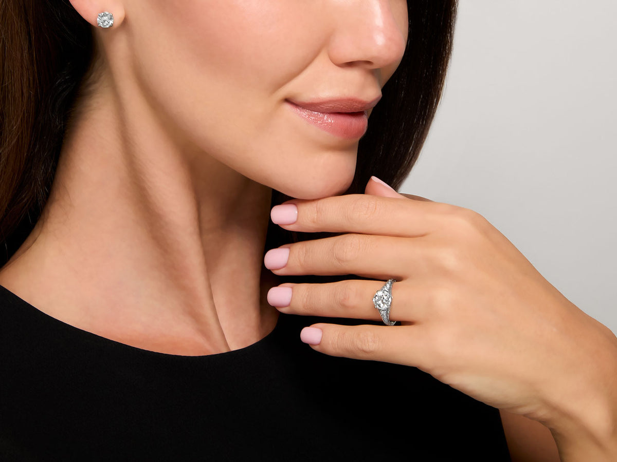 Woman wearing a platinum diamond solitaire ring