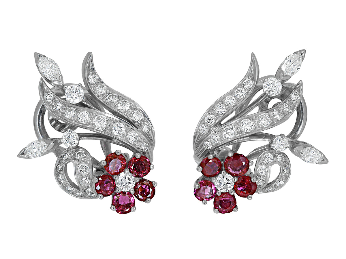 Platinum floral earrings with diamond ribbons and ruby flowers