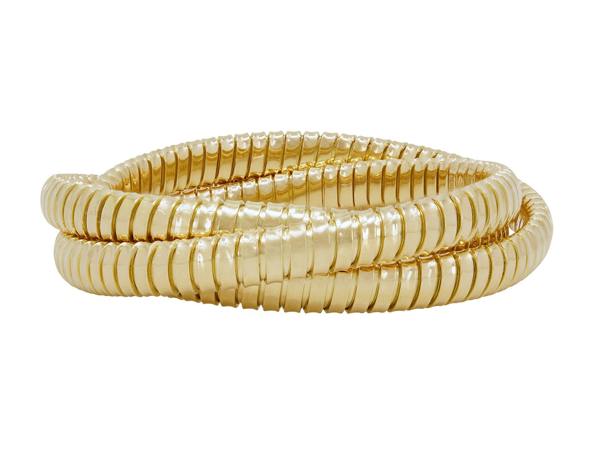 Three interlocking 18K yellow gold tubogas bracelets