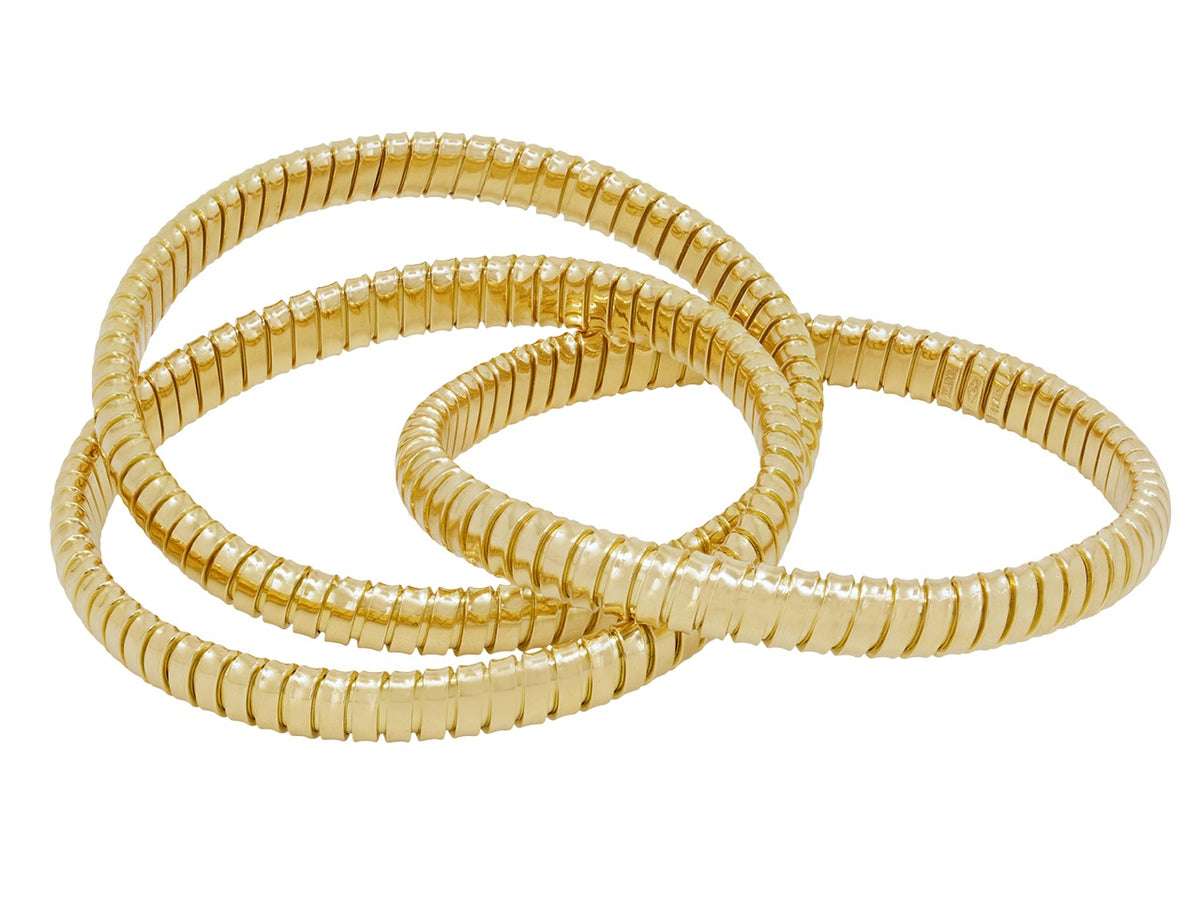 Three interlocking 18k yellow gold tubogas bracelets