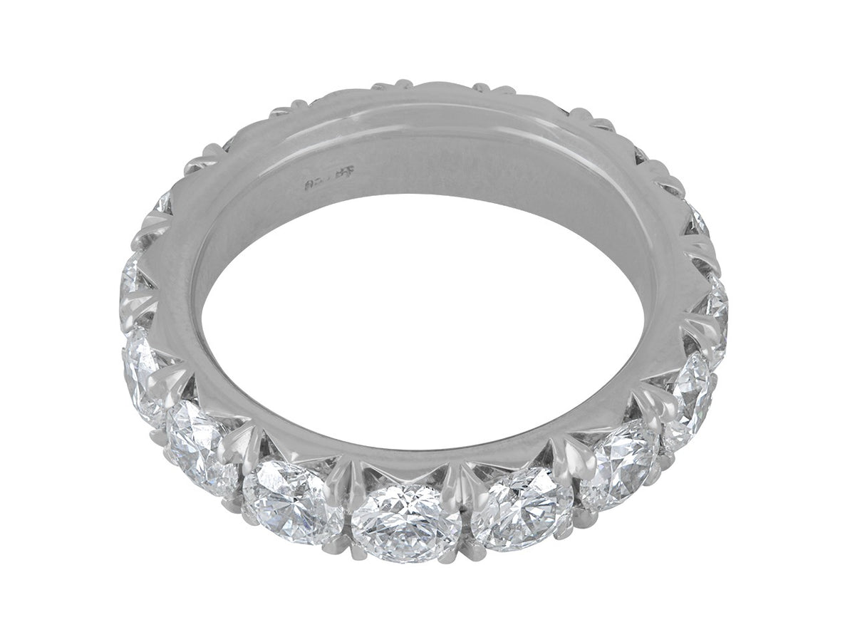 Platinum diamond eternity band with round brilliant stones