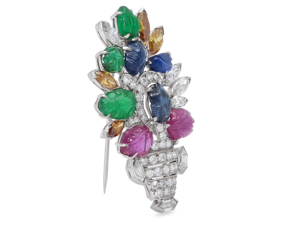 Platinum Art Deco brooch with carved colorful gemstone flowers