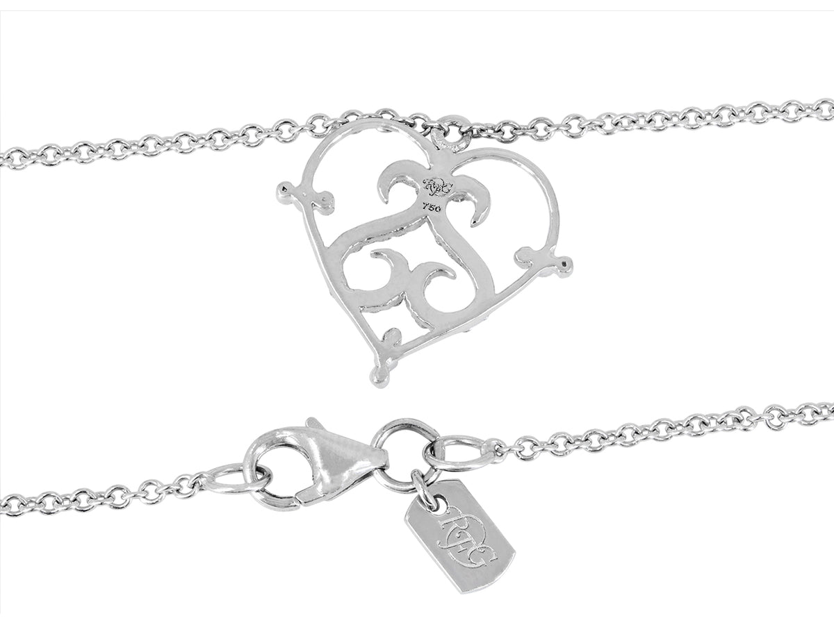 Open diamond heart pendant with scrollwork and chain