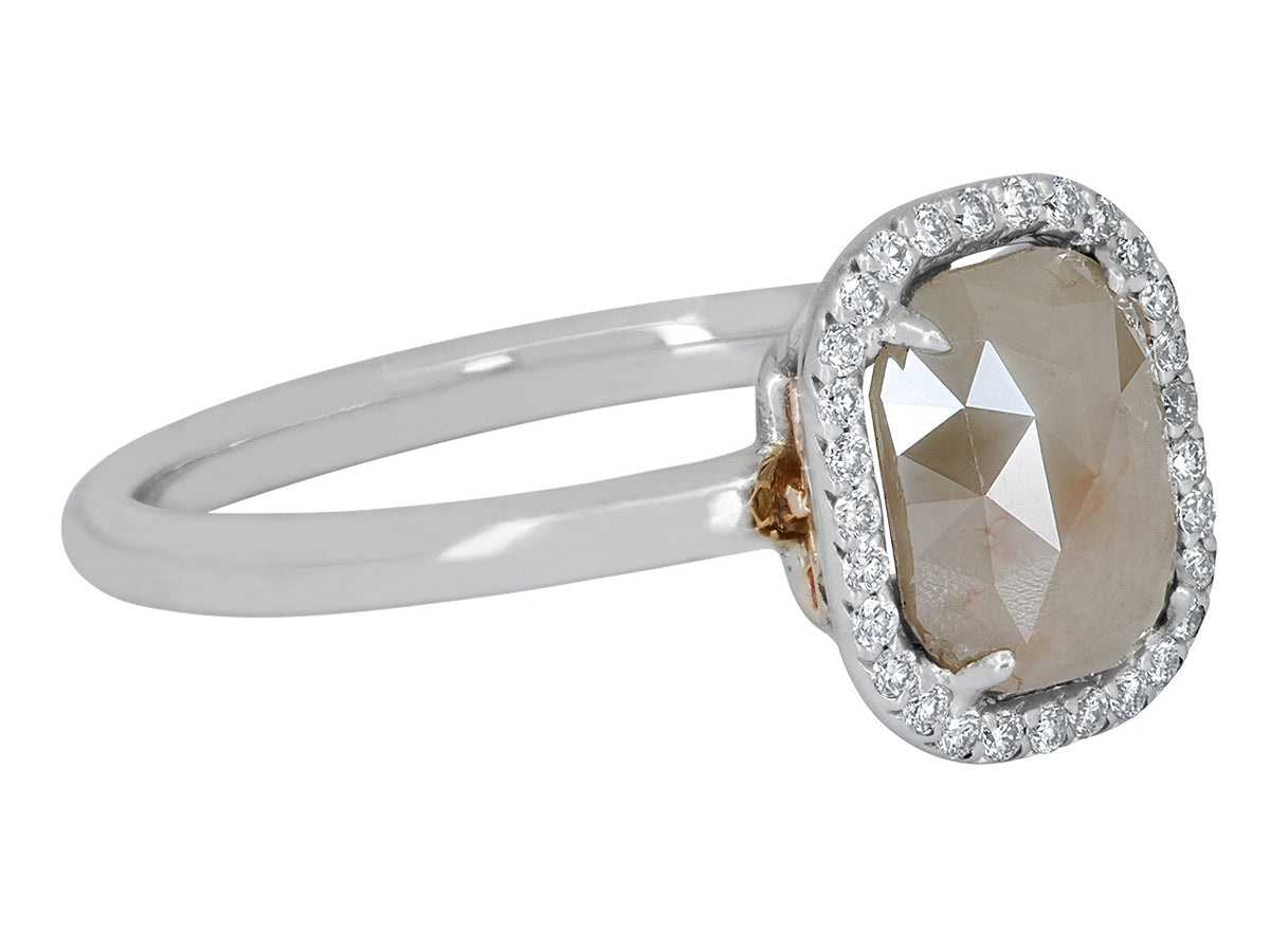 Raw diamond halo ring in polished white gold