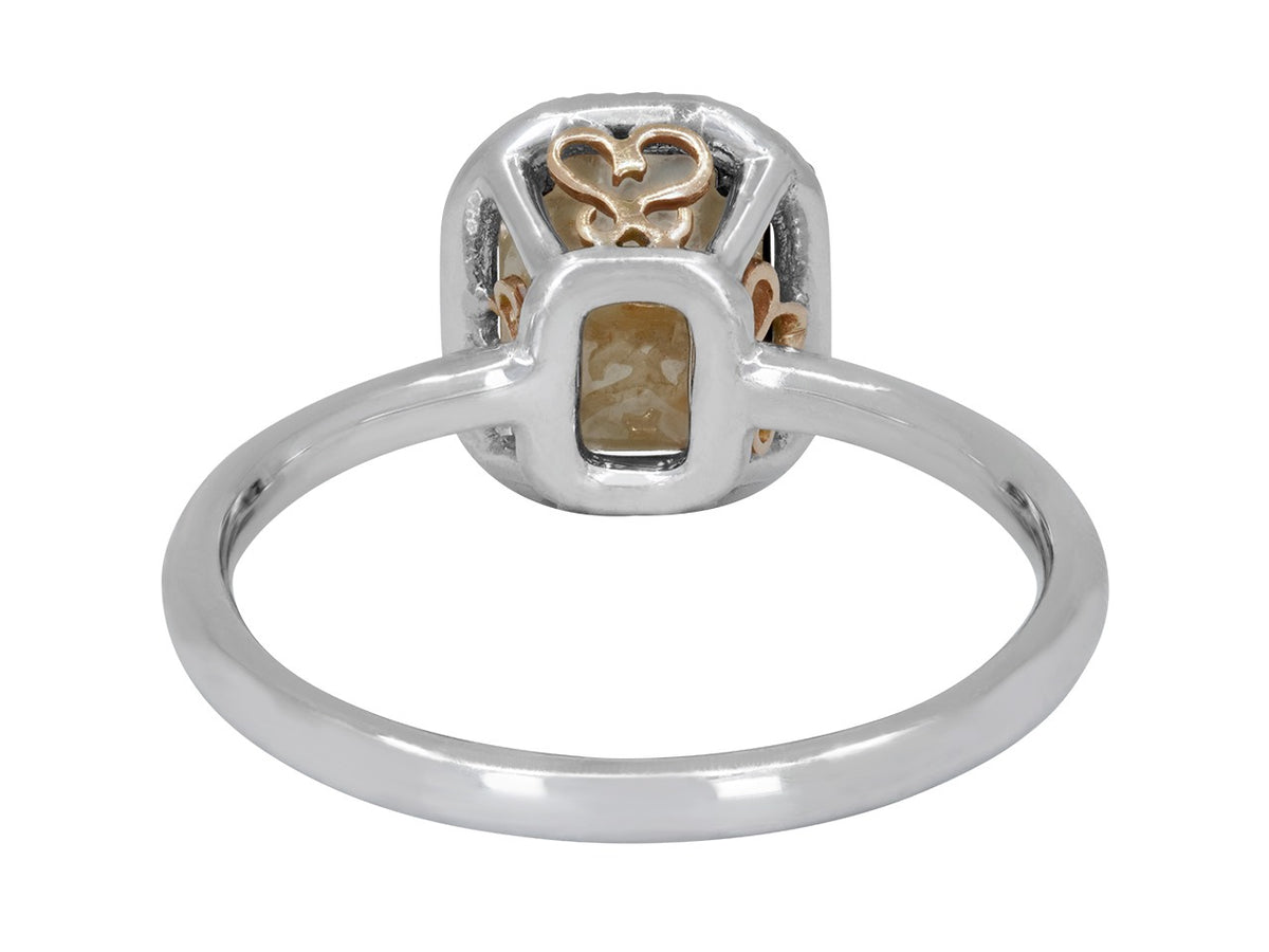 Rear view of an 18K white gold ring with raw diamond setting
