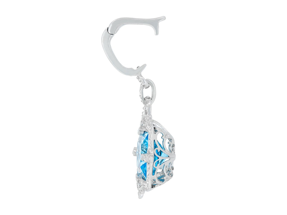 Side view of blue topaz and diamond pendant in white gold