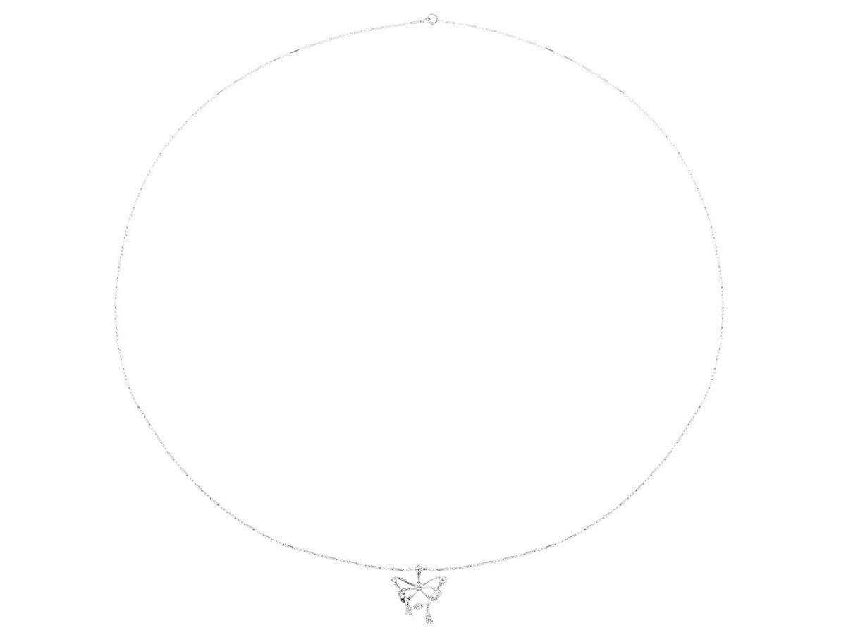 Platinum bow pendant necklace with diamond accents