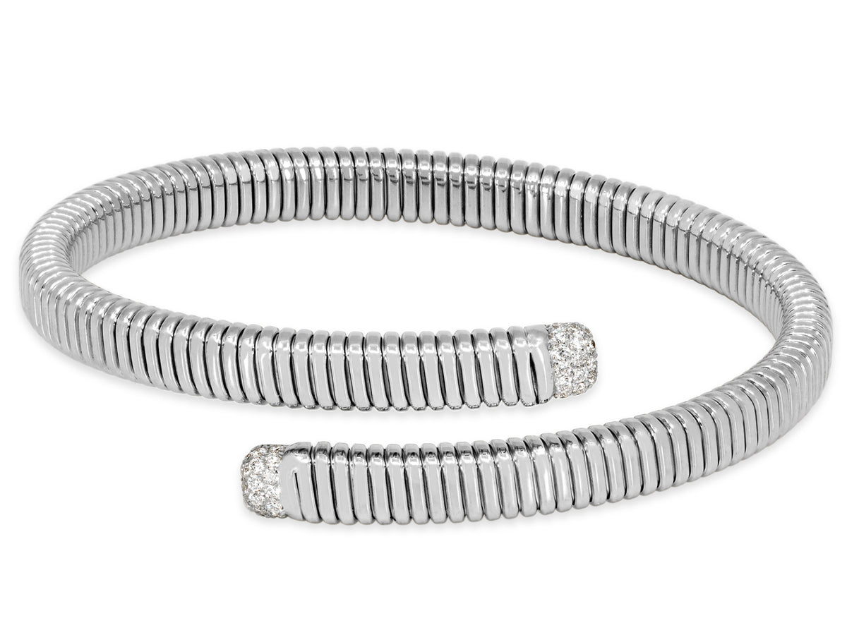 18K white gold tubogas bypass bracelet with diamond terminals