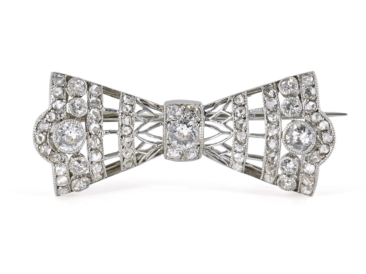 Antique platinum bow pin with old European diamonds