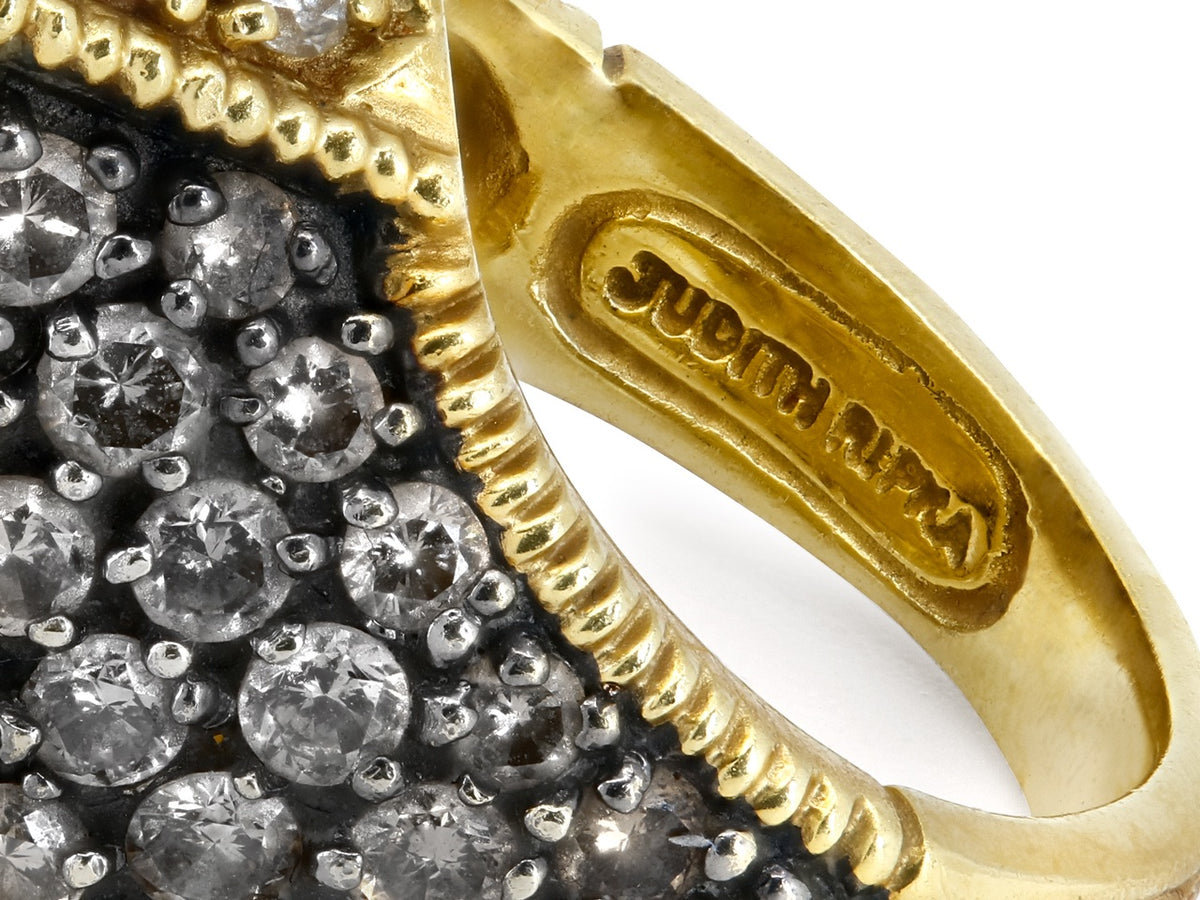 Close-up of Judith Ripka 18K gold ring interior with diamond pavé