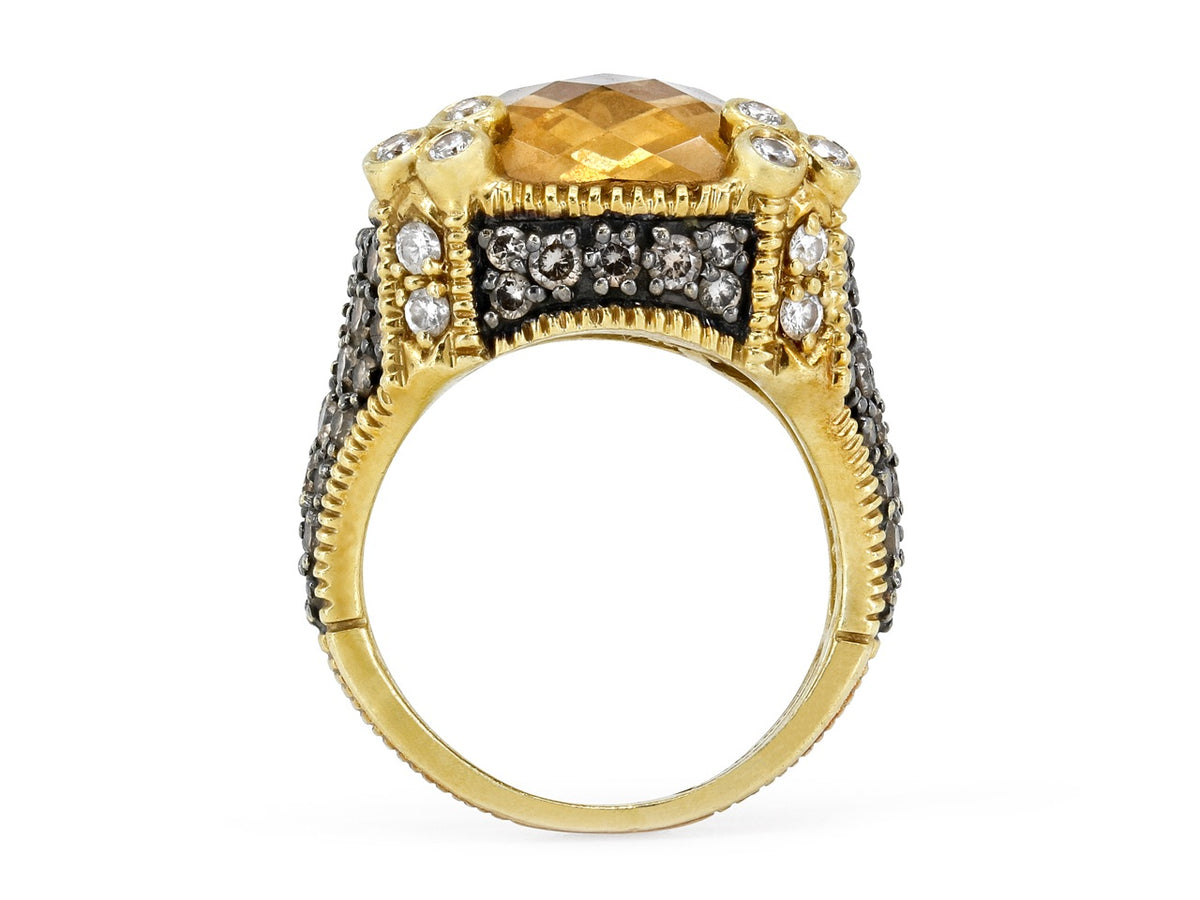 Side view of an 18K gold citrine and diamond ring